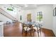 Spacious open floor plan with dining, living, and kitchen areas, all bathed in natural light at 2822 Waters Sw Rd, Atlanta, GA 30354