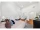 Bright bedroom with hardwood floors, high ceilings, and an attached bathroom at 2822 Waters Sw Rd, Atlanta, GA 30354