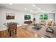 Finished basement with wood flooring, recessed lighting, sofa, chairs, and a foosball table at 2907 Wickford Dr, Kennesaw, GA 30152