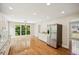 Bright eat-in kitchen offers stainless steel appliances, granite countertops, hardwood floors and backyard views at 2907 Wickford Dr, Kennesaw, GA 30152