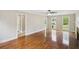 Spacious living room with hardwood floors, neutral paint, and lots of natural light at 2907 Wickford Dr, Kennesaw, GA 30152
