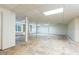 Unfinished basement with natural light, support beams and storage at 5287 Vernon Lake Dr, Atlanta, GA 30338