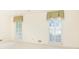 Sunny bedroom with large windows and neutral paint, offering a serene space at 5287 Vernon Lake Dr, Atlanta, GA 30338