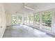 Bright sunroom with large windows offering lots of natural light and exterior access at 5287 Vernon Lake Dr, Atlanta, GA 30338