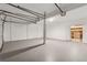 Spacious two-car garage with ample room for vehicles, storage, and hobbies at 12290 Greenmont Walk, Alpharetta, GA 30009