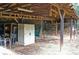 Rustic barn interior with wooden beams and ample storage space for tools and equipment at 3129 Etchison Rd, Loganville, GA 30052
