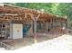 The interior of the barn provides ample storage at 3129 Etchison Rd, Loganville, GA 30052
