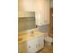 Cozy bathroom with a double sink vanity, mirror and white cabinets at 3129 Etchison Rd, Loganville, GA 30052