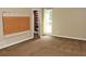 Bedroom featuring neutral carpeting, a closet, and a bright window for natural light at 3129 Etchison Rd, Loganville, GA 30052