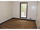 Cozy bedroom featuring neutral carpeting and a bright window at 3129 Etchison Rd, Loganville, GA 30052
