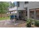 View of the backyard featuring a patio with an awning at 3202 Ivy Station Way, Duluth, GA 30096