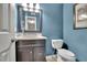 Charming bathroom with decorative mirror and unique, stand alone bowl sink at 3202 Ivy Station Way, Duluth, GA 30096