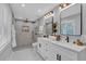 Contemporary bathroom featuring double sinks, modern fixtures, and a spacious shower, creating a spa-like experience at 4492 Riverwood Cir, Decatur, GA 30035