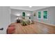 Bright bedroom with hardwood floors and a view to the backyard at 4492 Riverwood Cir, Decatur, GA 30035
