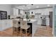 Stylish kitchen island with seating and stainless steel appliances, perfect for modern living at 4492 Riverwood Cir, Decatur, GA 30035