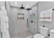 Contemporary walk-in shower with dual shower heads, a built-in niche, and stylish tiling for modern elegance at 4492 Riverwood Cir, Decatur, GA 30035