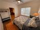 Cozy bedroom setup with natural lighting, closet space, and hardwood flooring at 55 Bowen Ave, Atlanta, GA 30315