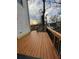 Recently renovated wooden deck with dark railings offering a private and relaxing outdoor space at 55 Bowen Ave, Atlanta, GA 30315