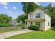 Charming two-story home with a welcoming front porch and well-maintained lawn at 55 Bowen Ave, Atlanta, GA 30315