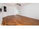 Hardwood flooring in a spacious room with natural lighting and a ceiling fan at 55 Bowen Ave, Atlanta, GA 30315