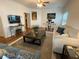 Bright living room featuring hardwood floors, neutral colors, and a cozy seating area at 55 Bowen Ave, Atlanta, GA 30315