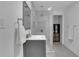 Modern bathroom features a glass-enclosed shower, contemporary vanity, and neutral color palette at 13 Highland Park Ne Ln, Atlanta, GA 30306