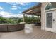 Relax on the deck while enjoying peaceful, wooded views at 13 Highland Park Ne Ln, Atlanta, GA 30306