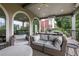 Enjoy outdoor entertaining on this covered deck with ample seating and open views at 13 Highland Park Ne Ln, Atlanta, GA 30306