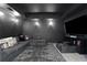 Home theater features a plush sectional sofa, a large screen, and sconce lighting at 13 Highland Park Ne Ln, Atlanta, GA 30306