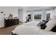 Bright main bedroom offering city views and including a dresser and exercise bike at 13 Highland Park Ne Ln, Atlanta, GA 30306