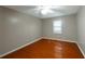 Spacious bedroom with hardwood floors and a ceiling fan at 134 Timber Creek Sw Ln, Marietta, GA 30060