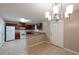 A well-lit kitchen with tile floors, modern appliances, and dark wood cabinets at 134 Timber Creek Sw Ln, Marietta, GA 30060