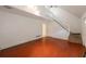 Bright and airy living room featuring wood floors and stairs to the upper level at 134 Timber Creek Sw Ln, Marietta, GA 30060
