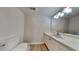 Clean bathroom with a single sink vanity and modern fixtures at 1704 Yarborough Dr, Peachtree City, GA 30269