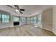 Bright living room featuring a fireplace and many windows for natural light at 1704 Yarborough Dr, Peachtree City, GA 30269