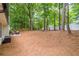 Expansive backyard featuring a patio, outdoor seating, and a fire pit at 2038 Summertown Dr, Norcross, GA 30071