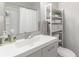 Updated bathroom features a sleek vanity, modern fixtures, and plenty of storage at 2038 Summertown Dr, Norcross, GA 30071
