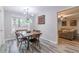Dining area with views of the backyard and an open layout to the living room, perfect for entertaining at 2038 Summertown Dr, Norcross, GA 30071