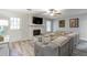 Comfortable living room with a stone fireplace, large sectional sofa, and stylish decor at 2038 Summertown Dr, Norcross, GA 30071