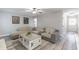 Cozy living room with a neutral color palette, plush seating, and ample natural light at 2038 Summertown Dr, Norcross, GA 30071