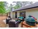 Cozy patio with outdoor seating and a grill, ideal for relaxation and dining at 2038 Summertown Dr, Norcross, GA 30071