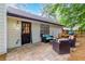 Charming patio area with comfortable seating and outdoor cooking space at 2038 Summertown Dr, Norcross, GA 30071