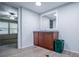 Bathroom featuring a wood vanity, grey walls and attractive wood-look flooring at 300 Old Boy Scout Rd, Whitesburg, GA 30185