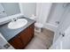 Cozy bathroom featuring a single-sink vanity with modern fixtures and shower at 300 Old Boy Scout Rd, Whitesburg, GA 30185