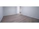 Bedroom showcasing luxury vinyl plank flooring and neutral paint at 300 Old Boy Scout Rd, Whitesburg, GA 30185