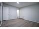 Spacious bedroom boasts sleek flooring, neutral walls, and an open doorway for easy access at 300 Old Boy Scout Rd, Whitesburg, GA 30185