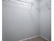 Walk-in closet features white wire shelving for ample storage at 300 Old Boy Scout Rd, Whitesburg, GA 30185
