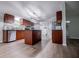 Open kitchen featuring stainless appliances, a central island, and wood cabinets at 300 Old Boy Scout Rd, Whitesburg, GA 30185