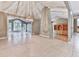 Open dining room with tile flooring, a decorative chandelier, and views of the sunroom at 3771 Club Nw Dr, Kennesaw, GA 30144