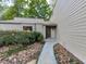 Charming front entrance with a stone pathway and well-maintained landscaping at 3771 Club Nw Dr, Kennesaw, GA 30144